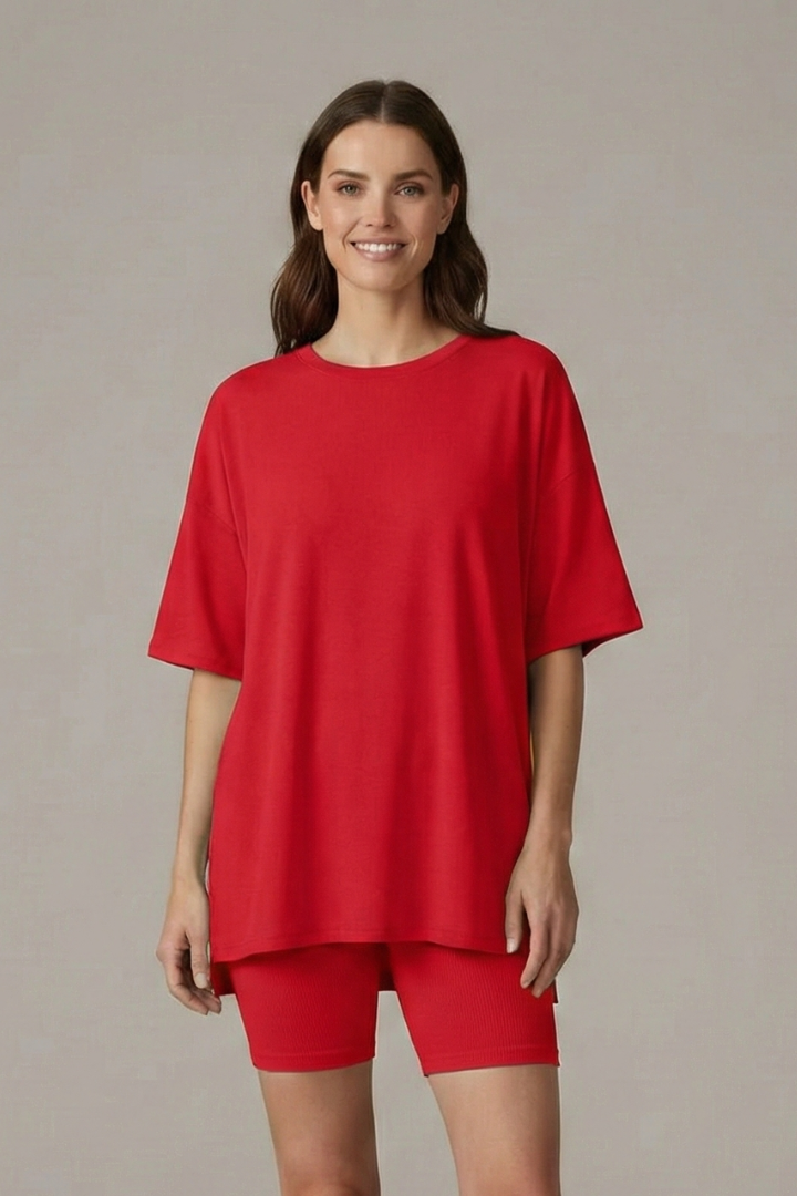 Woman natural stance loose red set gray background