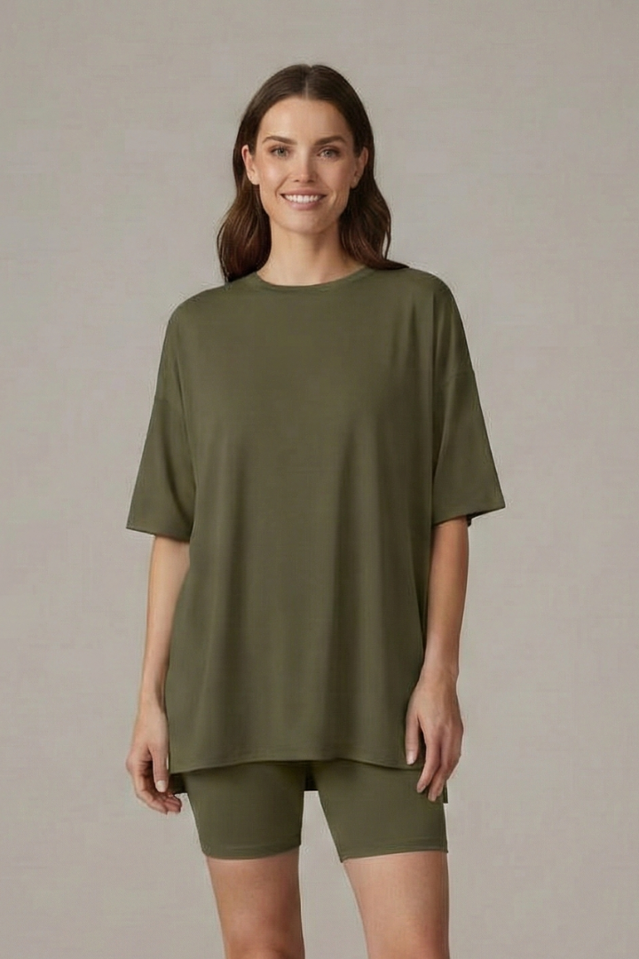 Female model front profile casual wear gray background