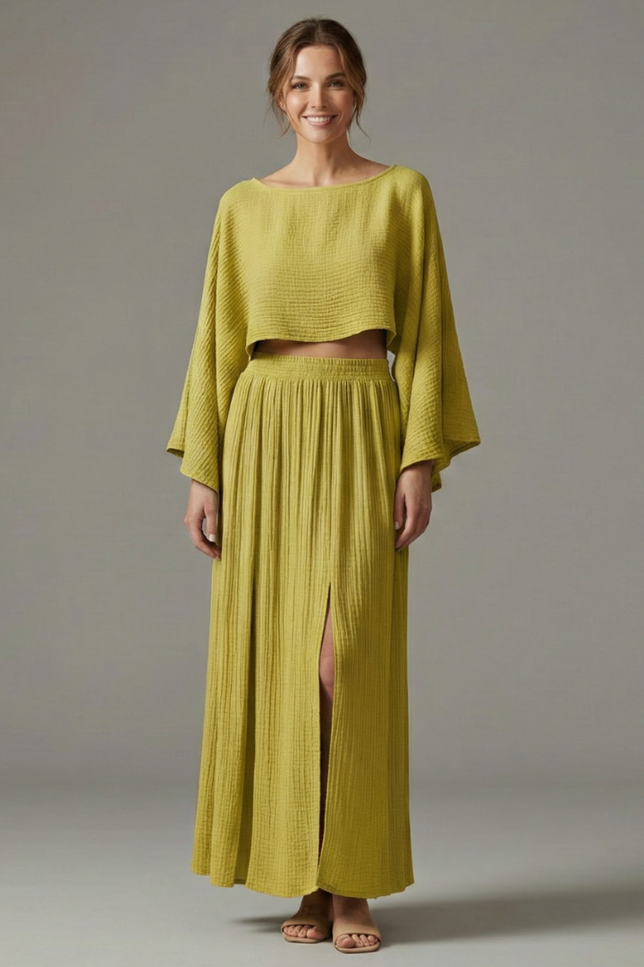 Yellow cropped blouse and maxi skirt on model
