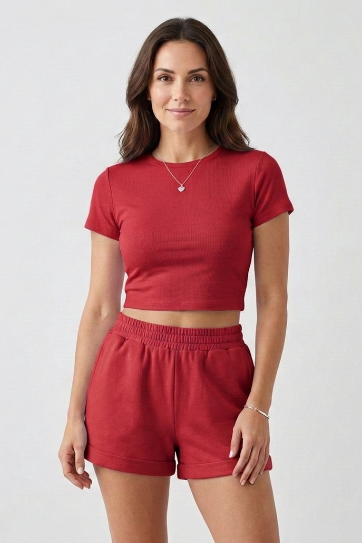 Female model posing redfront view plain background