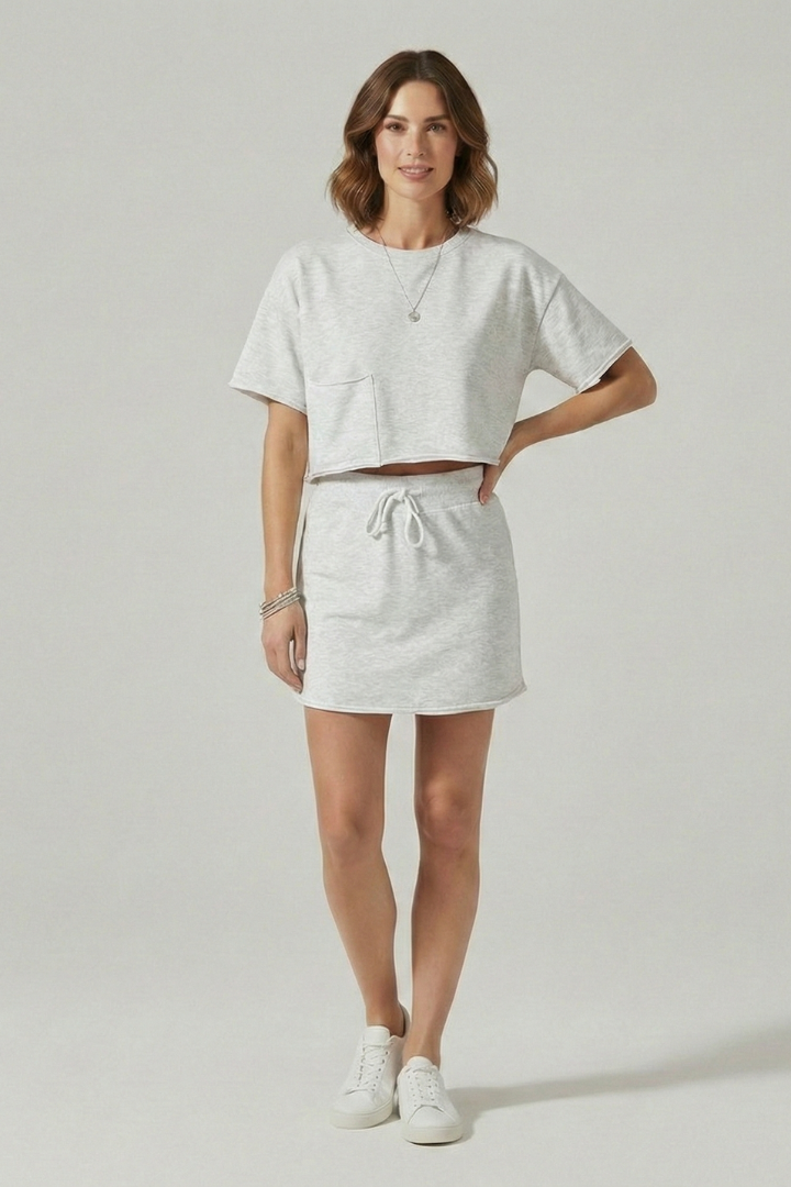 Front pose of stylish co-ord outfit all white model