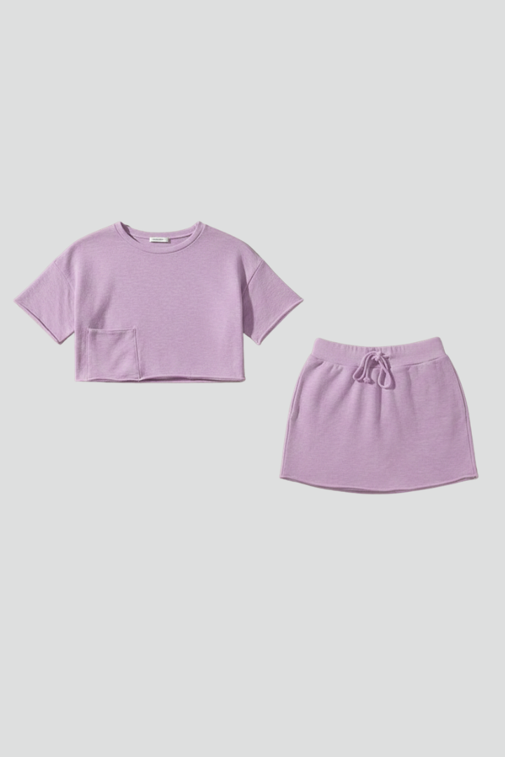 Full length shot of matching set in gray background