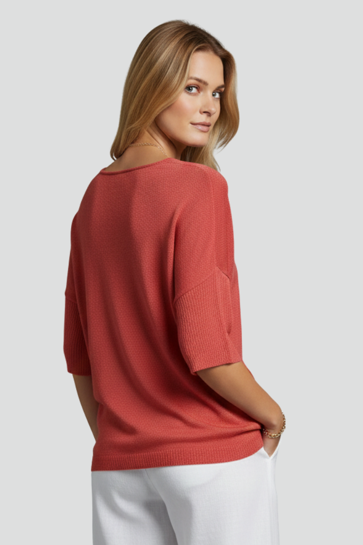 Back angle red knit top studio image