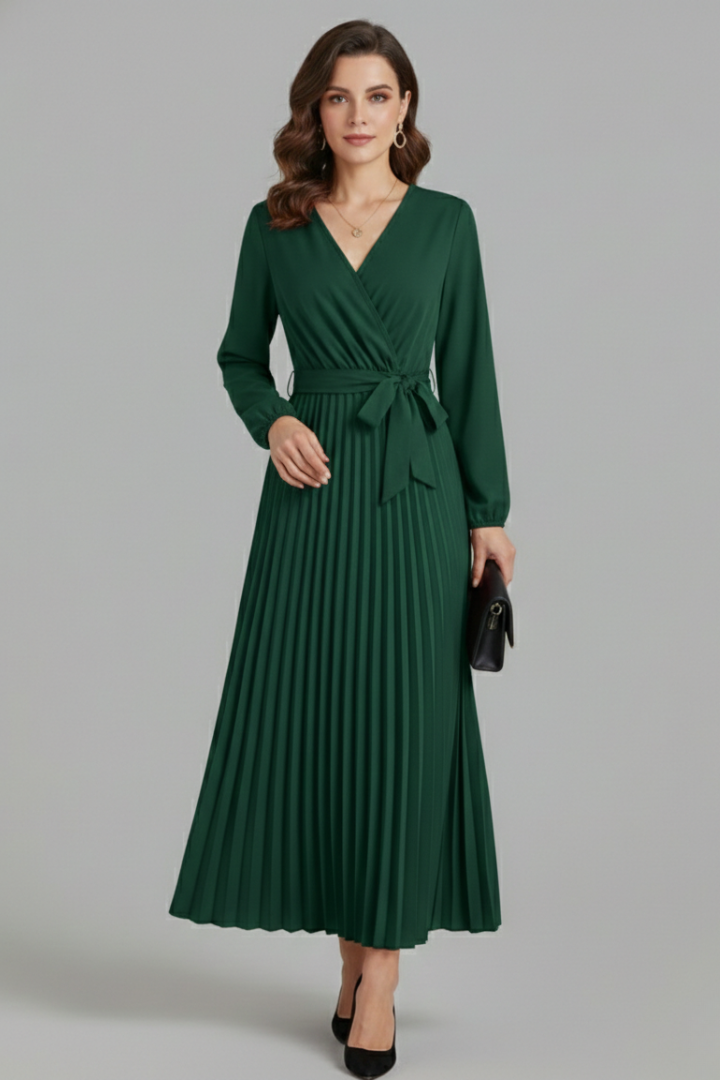 Lady wearing long sleeve pleated green dress 