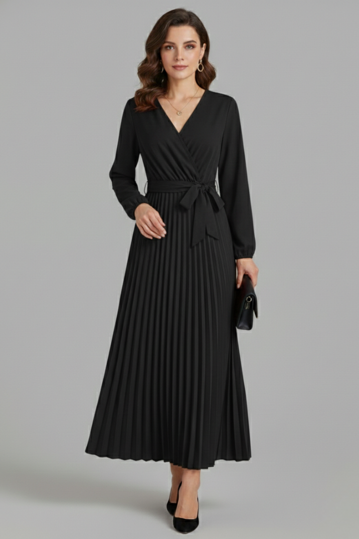 Lady wearing skirt pleated maxi dress gray background