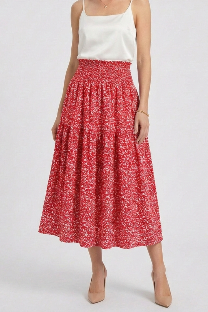 Front pose flared red skirt in gray background
