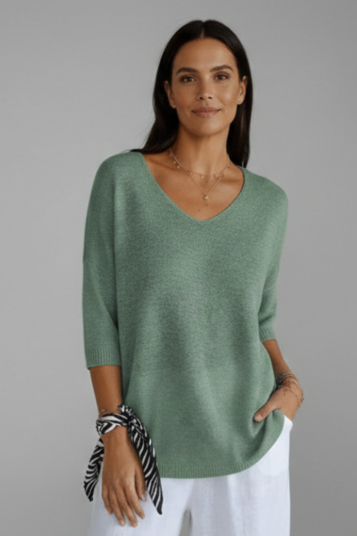Front angle women’s blouse on gray background