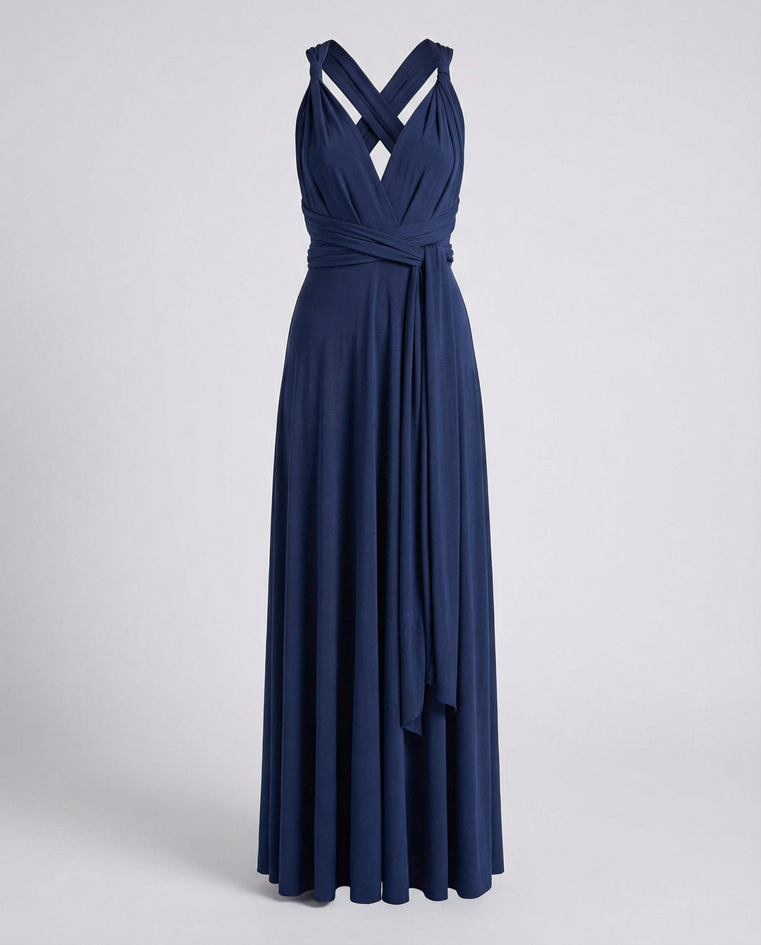 An evening wrap gown with flowing hemline on a plain background.