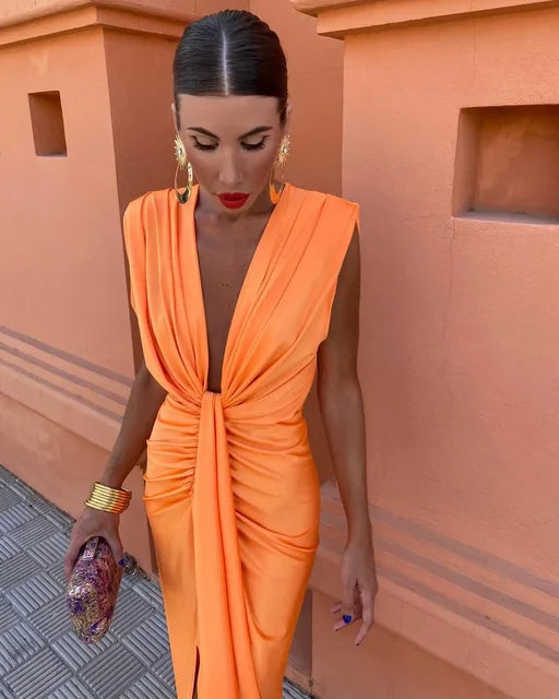 Model wearing a sleeveless fitted maxi dress