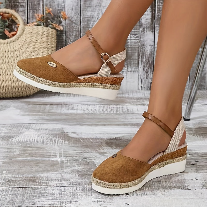 Foot walking pose in wedge sandals on gray floor