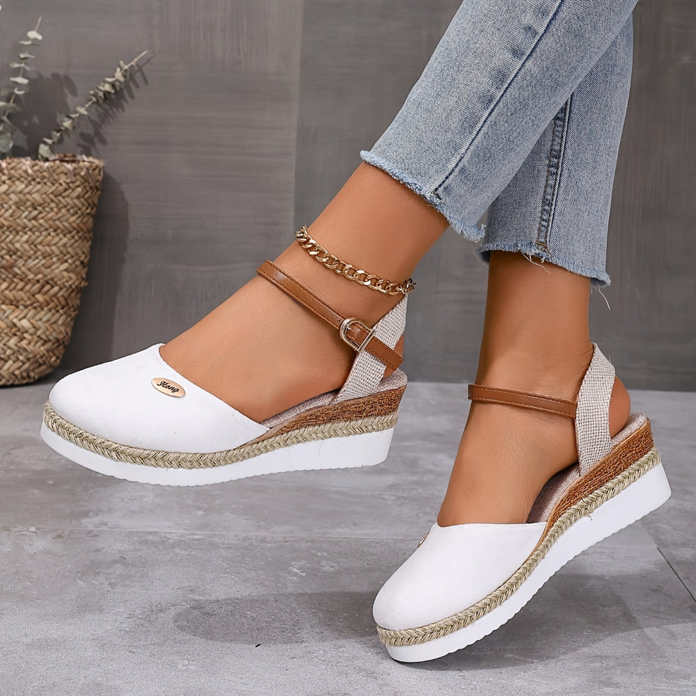 Top view foot model wearing stylish summer sandals gray background