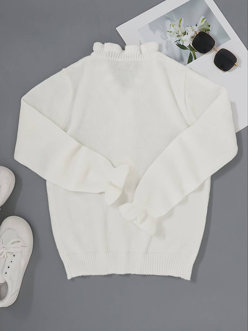 Elegant ruffle blouse displayed on a clean plain background with decorative button details, back view