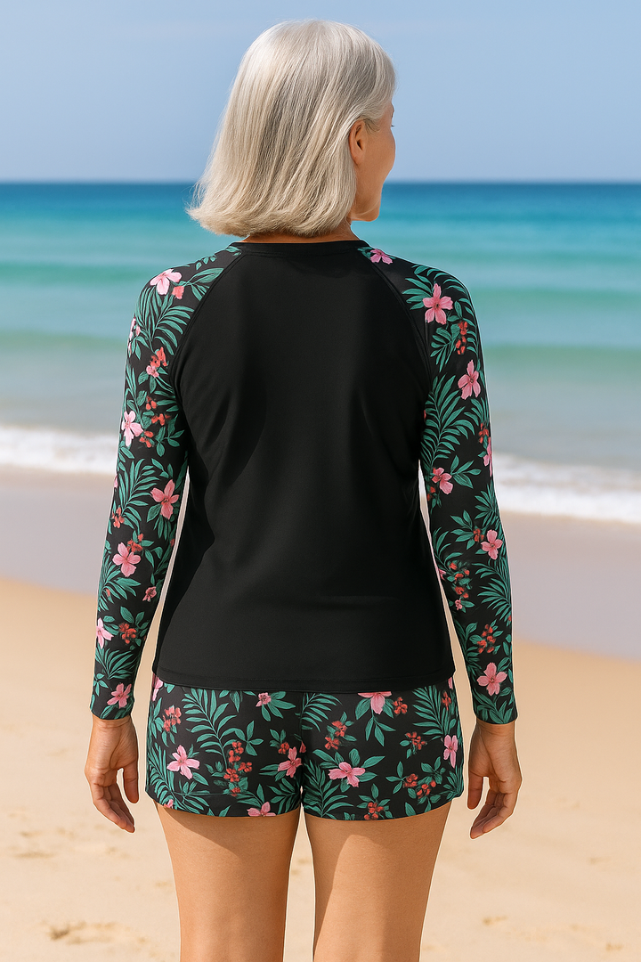 Female model in lightweight swimwear standing on a plain background,back view