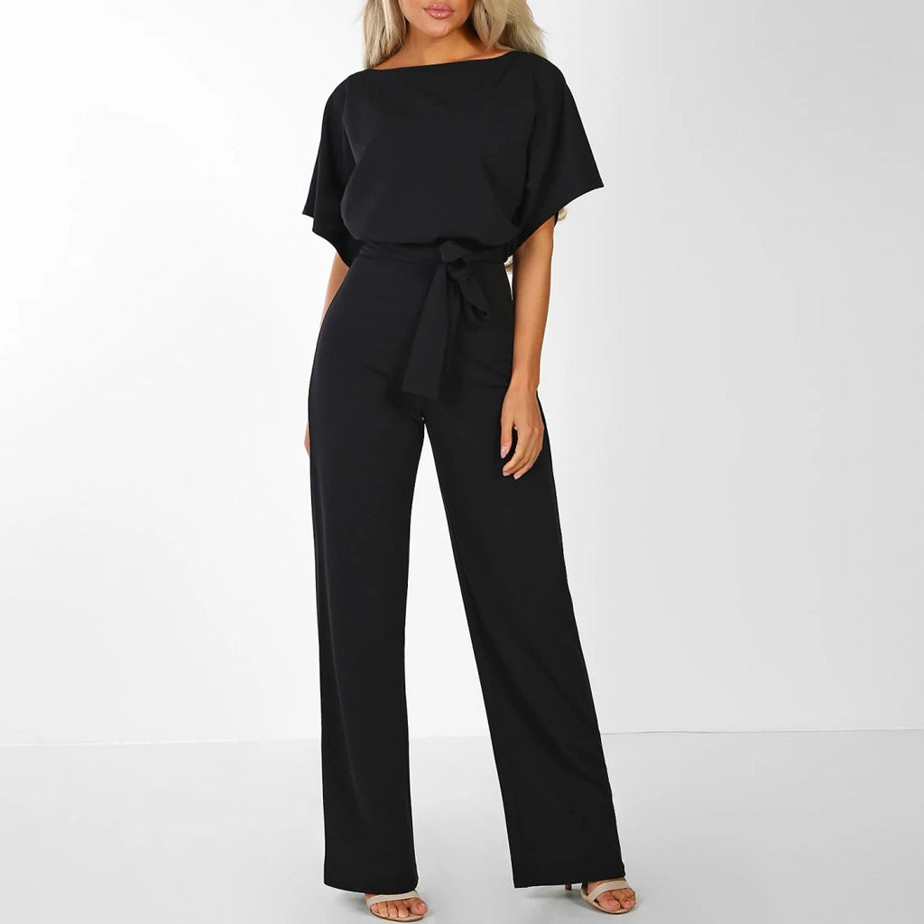 Model front showing back detail plain background fashion shot