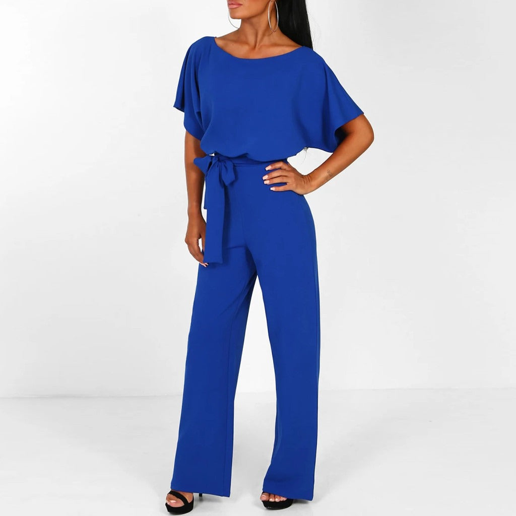 Model confident pose highlighting short sleeves plain background studio look