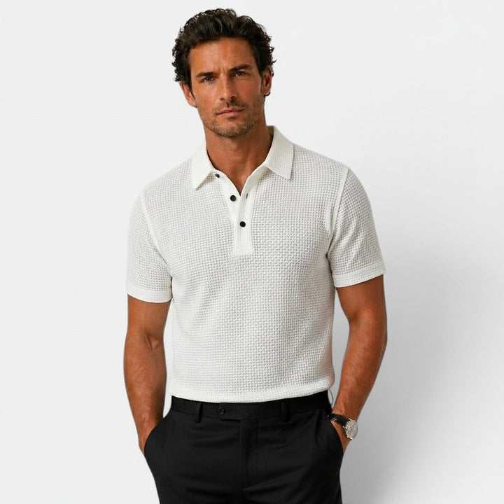  Model in a slim fit polo shirt with a clean everyday look.