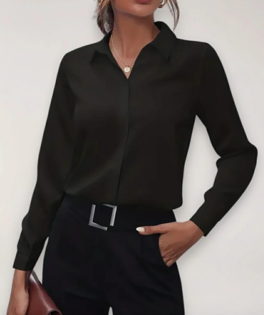 Polished summer office blouse featuring a structured front and clean neckline.
