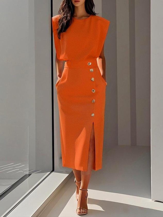  Female wearing a graceful dress with subtle button detailing on a plain background.