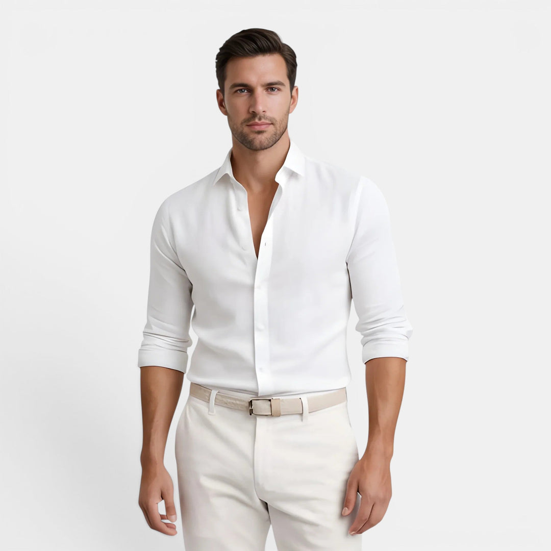 Male model wearing a lightweight button-up shirt against a plain background.