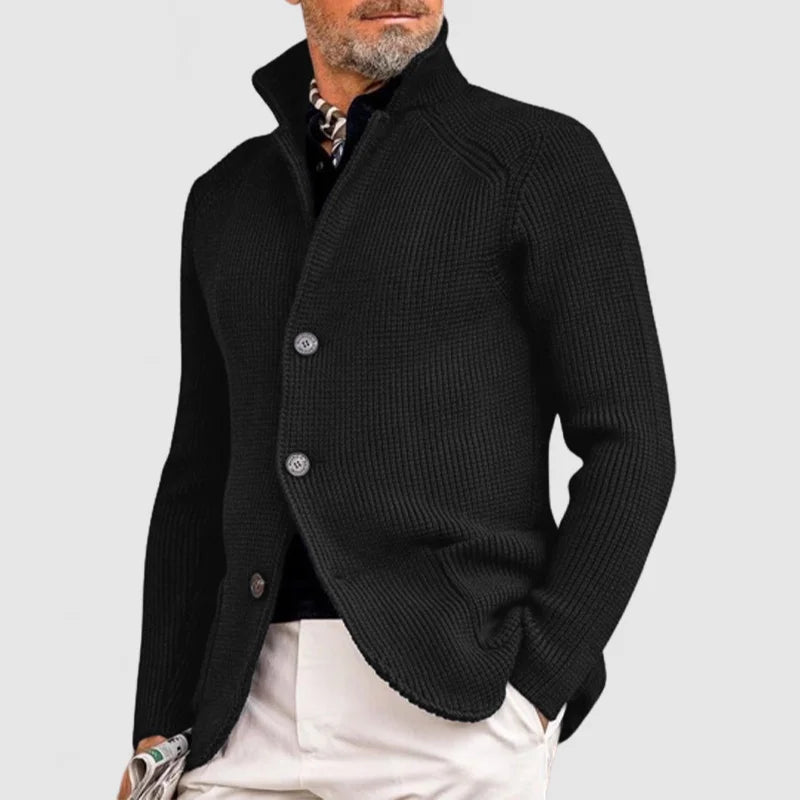  Male model displaying a linen blazer and matching trousers on a plain background.