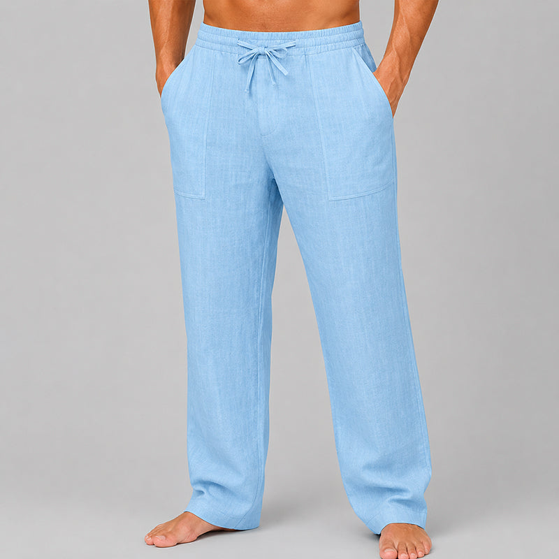  Model showcasing casual men’s drawstring pants on a plain background.
