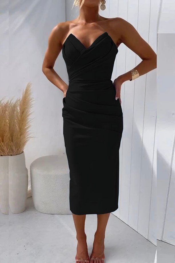 Model showcasing a fitted strapless dress  