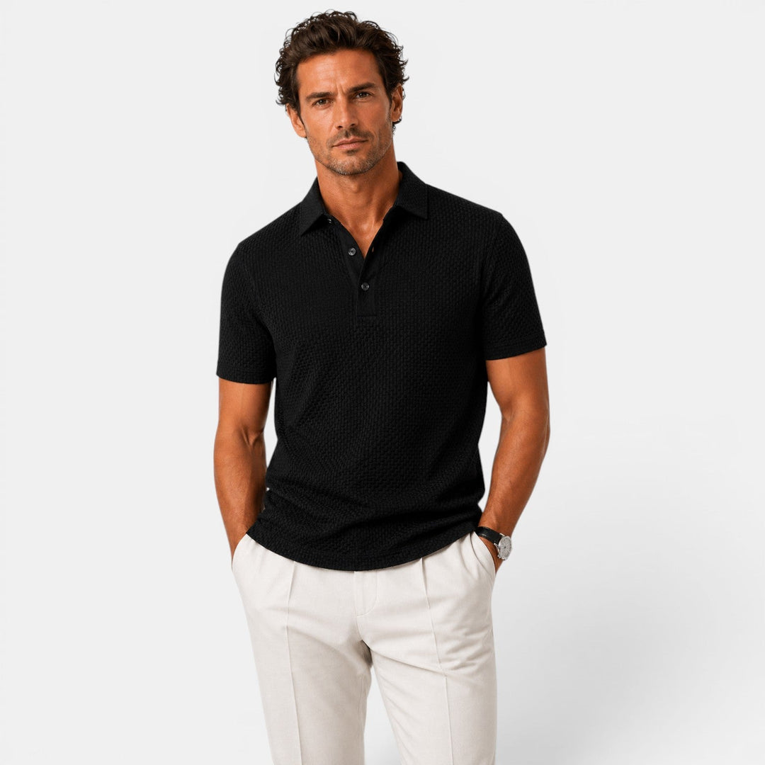  Model wearing a lightweight polo shirt against a plain background.