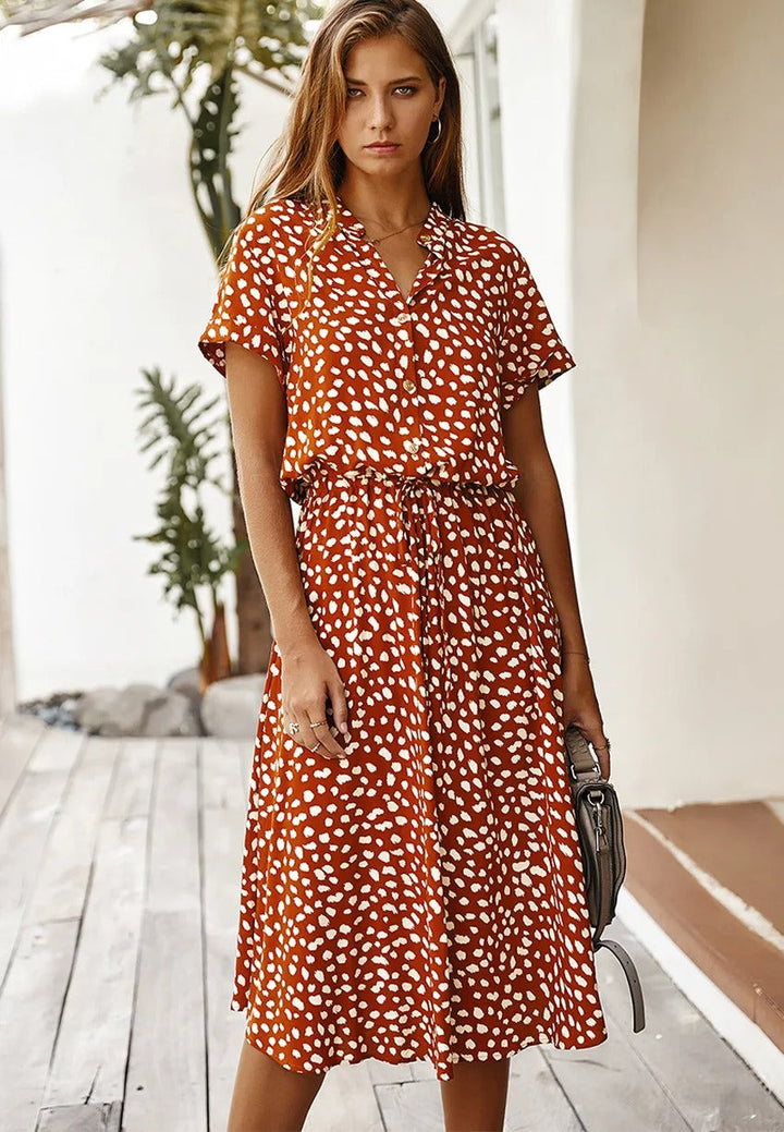 Casual light color dress with white spots and buttons
