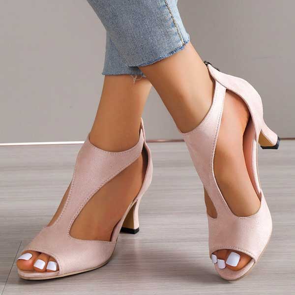Foot model wearing stylish summer sandals front view plain background