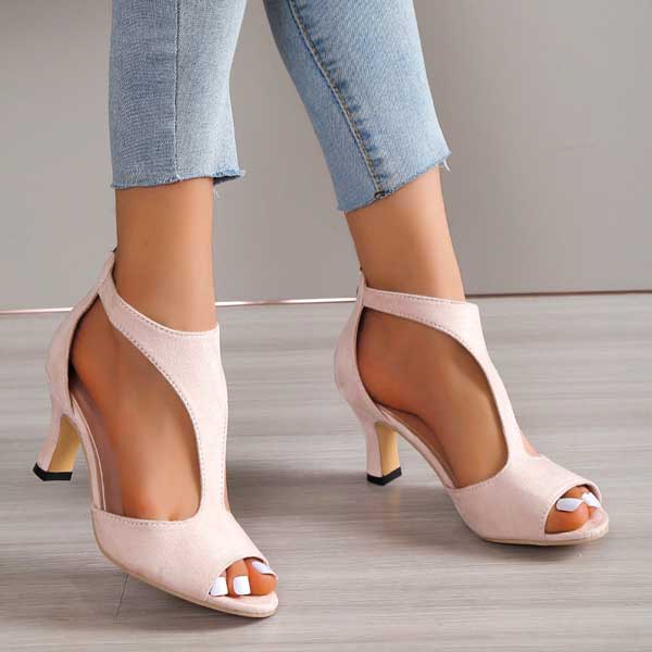 Model side angle wearing casual sandals clean plain background