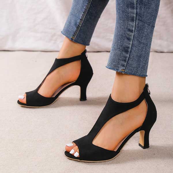Model pose in sandals isolated plain background scene