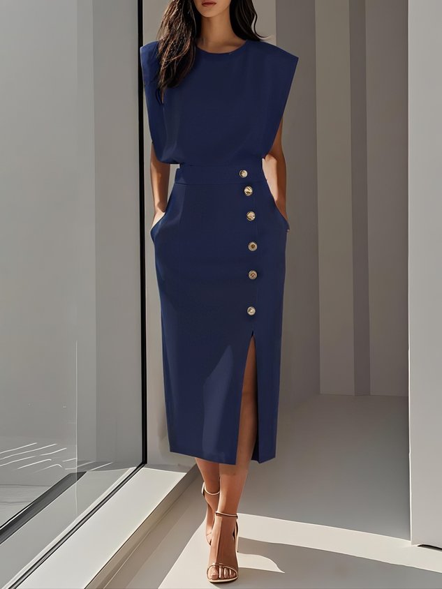  Woman wearing a stylish midi dress suited for daily wear on a plain background.