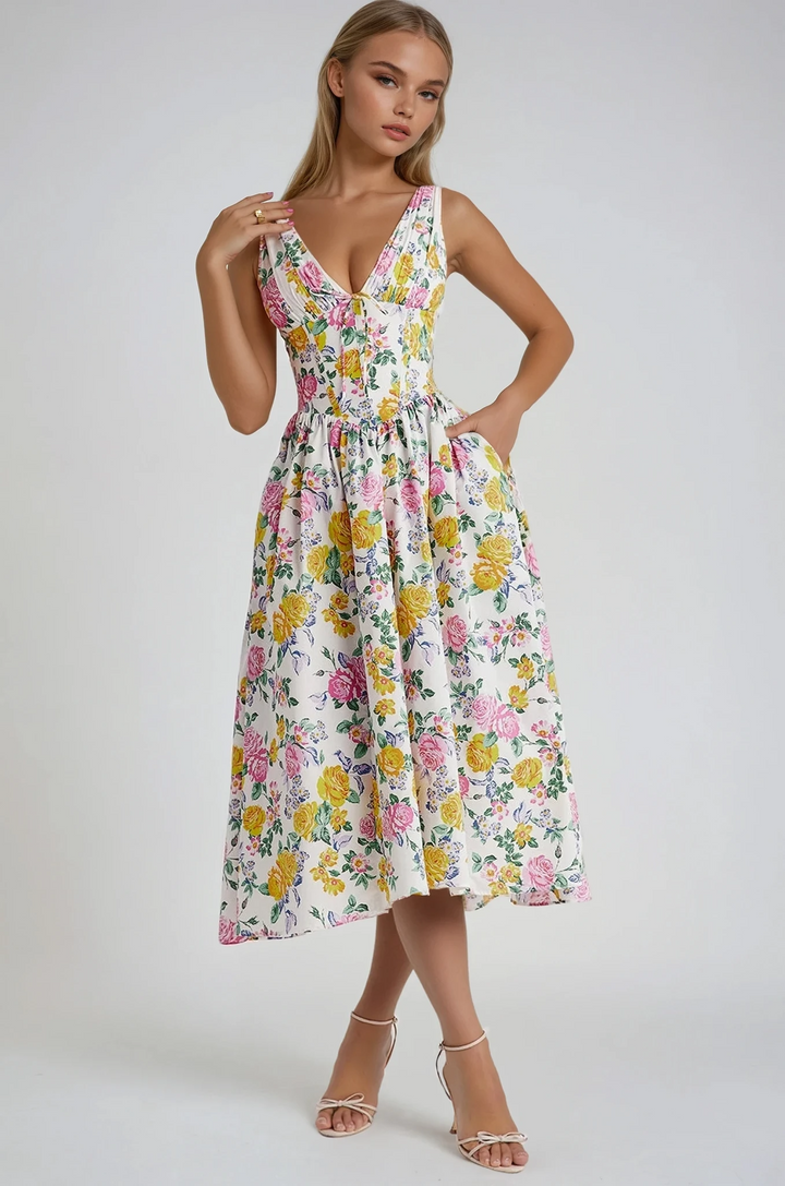 Women’s flowing formal dress displayed on a plain background.