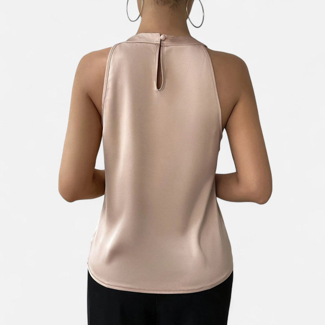 Back angle, a refined draped satin top with a polished high neckline against a plain background.