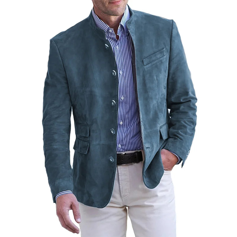 Male model wearing a mandarin collar blazer with button-front styling against a plain background.