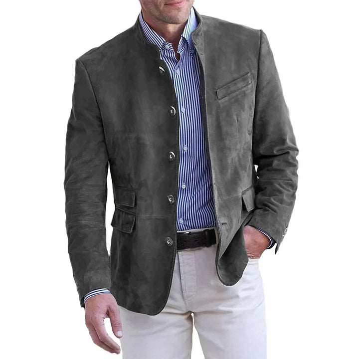  Male model wearing a smart casual blazer with a clean collar design against a plain background.