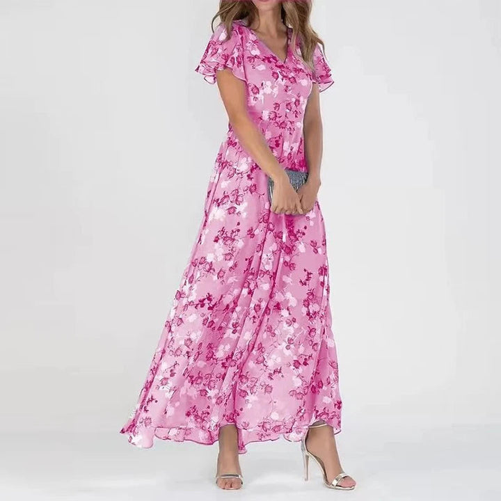 Female model showcasing a refined midi dress with a clean plain background.