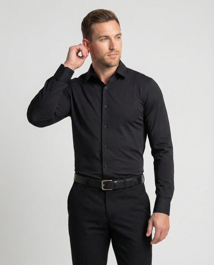 Male model wearing a polished formal shirt on a plain background.