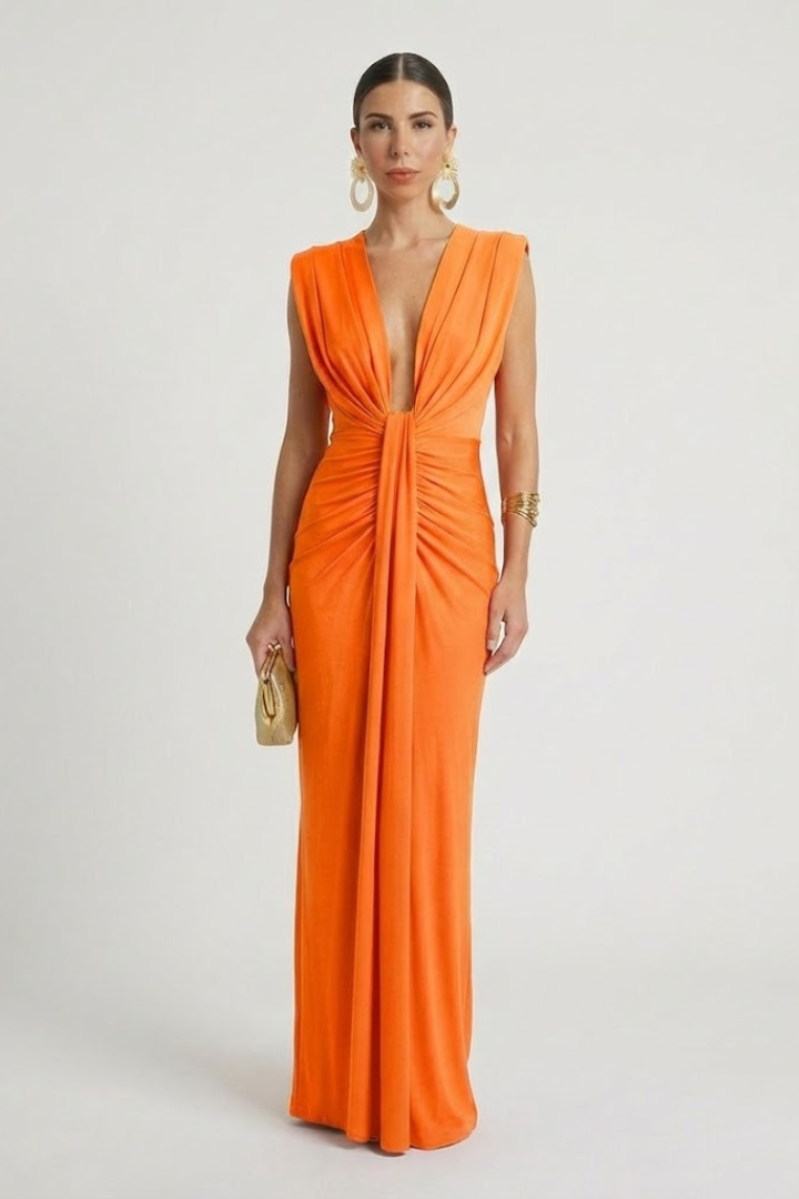 Female model showing back angle of sleeveless maxi dress beautifully.