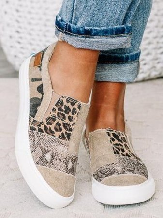 Close-up animal print canvas shoes with cushioned soles