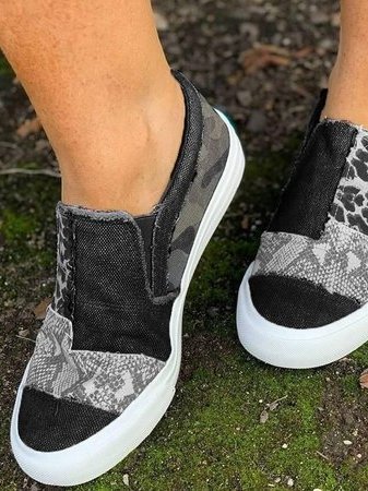 Front facing slip-on shoes with rounded toe caps