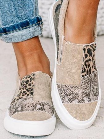 Front facing slip-on shoes with rounded toe caps