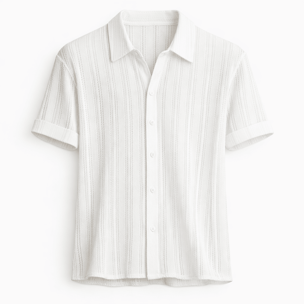 A  relaxed short sleeve shirt on a plain background.