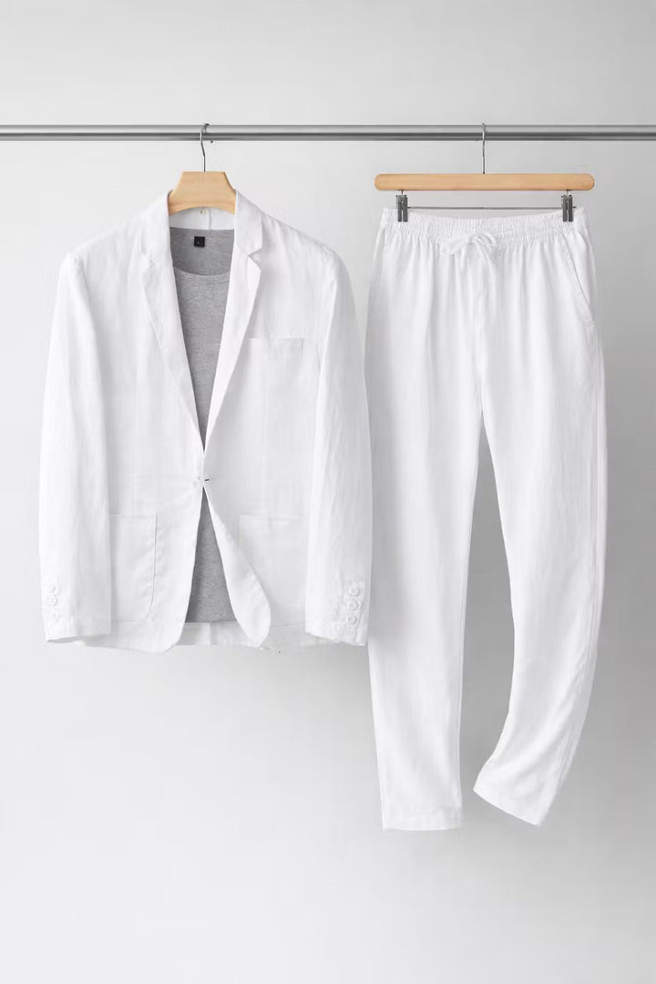 A classic blazer and matching trousers on a plain background.