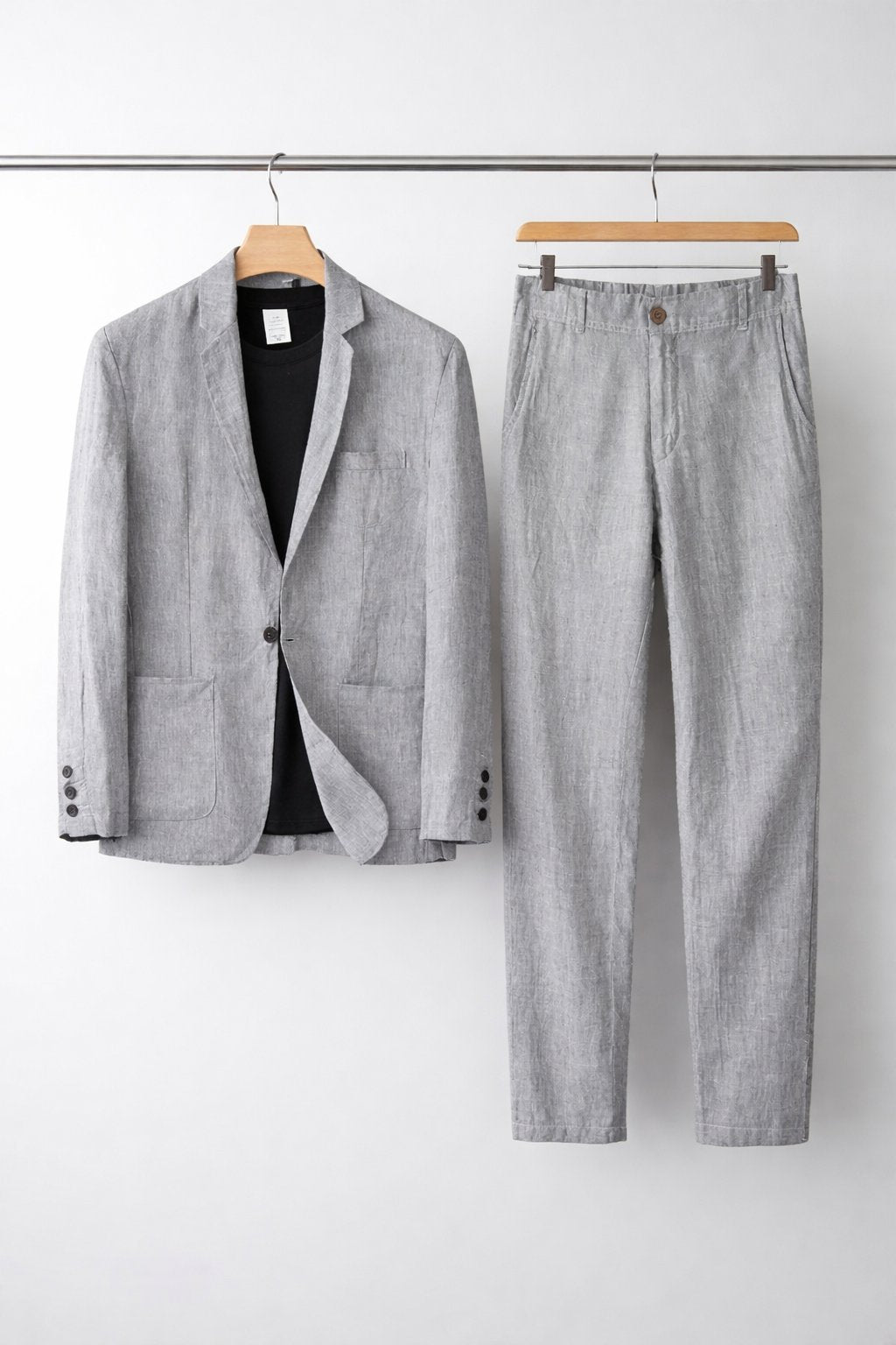 A stylish formalwear look on a plain background.