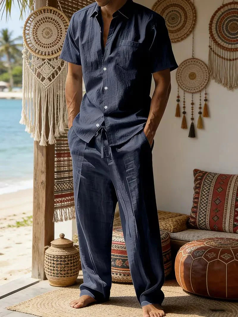 Male model wearing a summer two-piece set against a plain background.