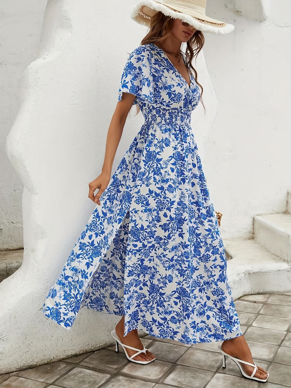 Flowy vacation dress with blue rose print design