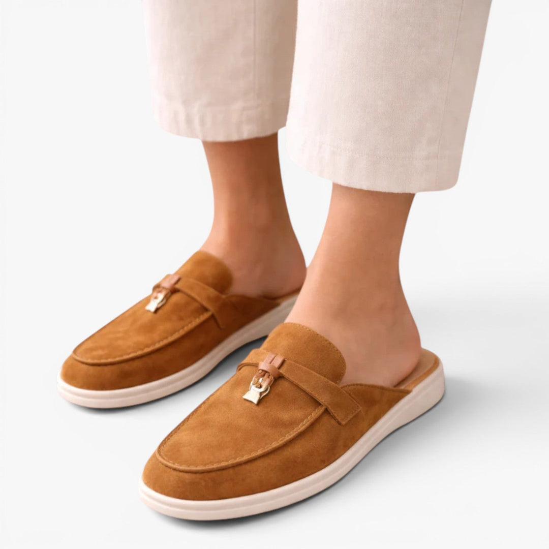  Open-back mule loafers with refined suede-textured finish on a plain background.