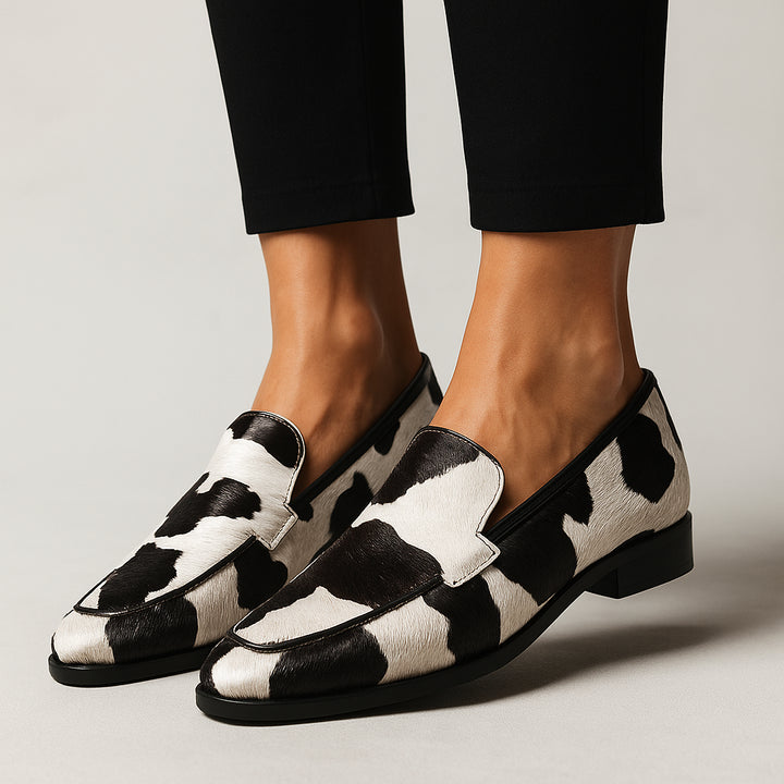 Joracine | Women's Orthopedic Comfort Slip-On Classic Cow Print Loafers with Slip On Design — 1