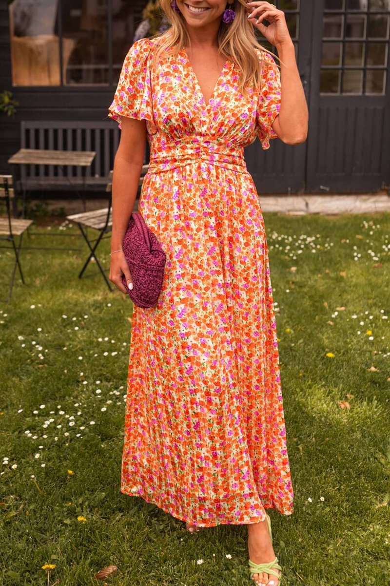 Floral maxi dress front view outdoors on grass